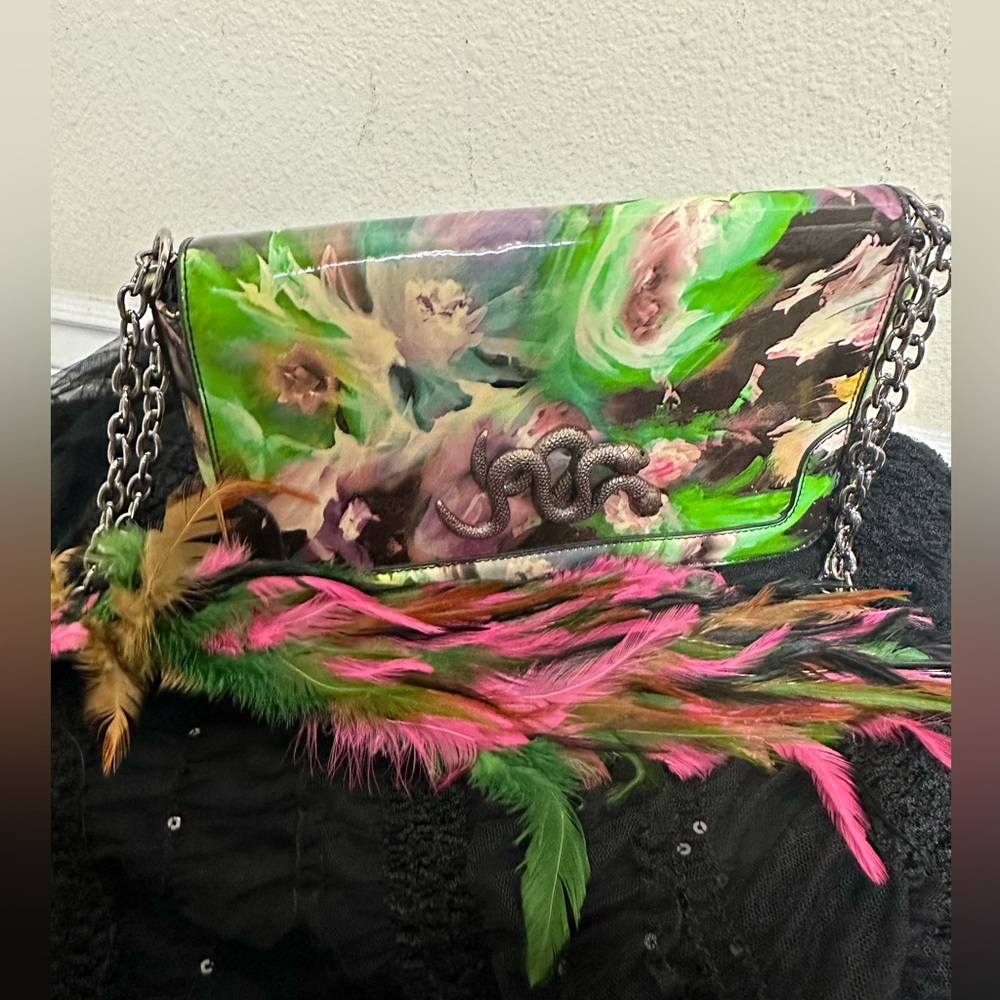 Sharif snake with feathers purse